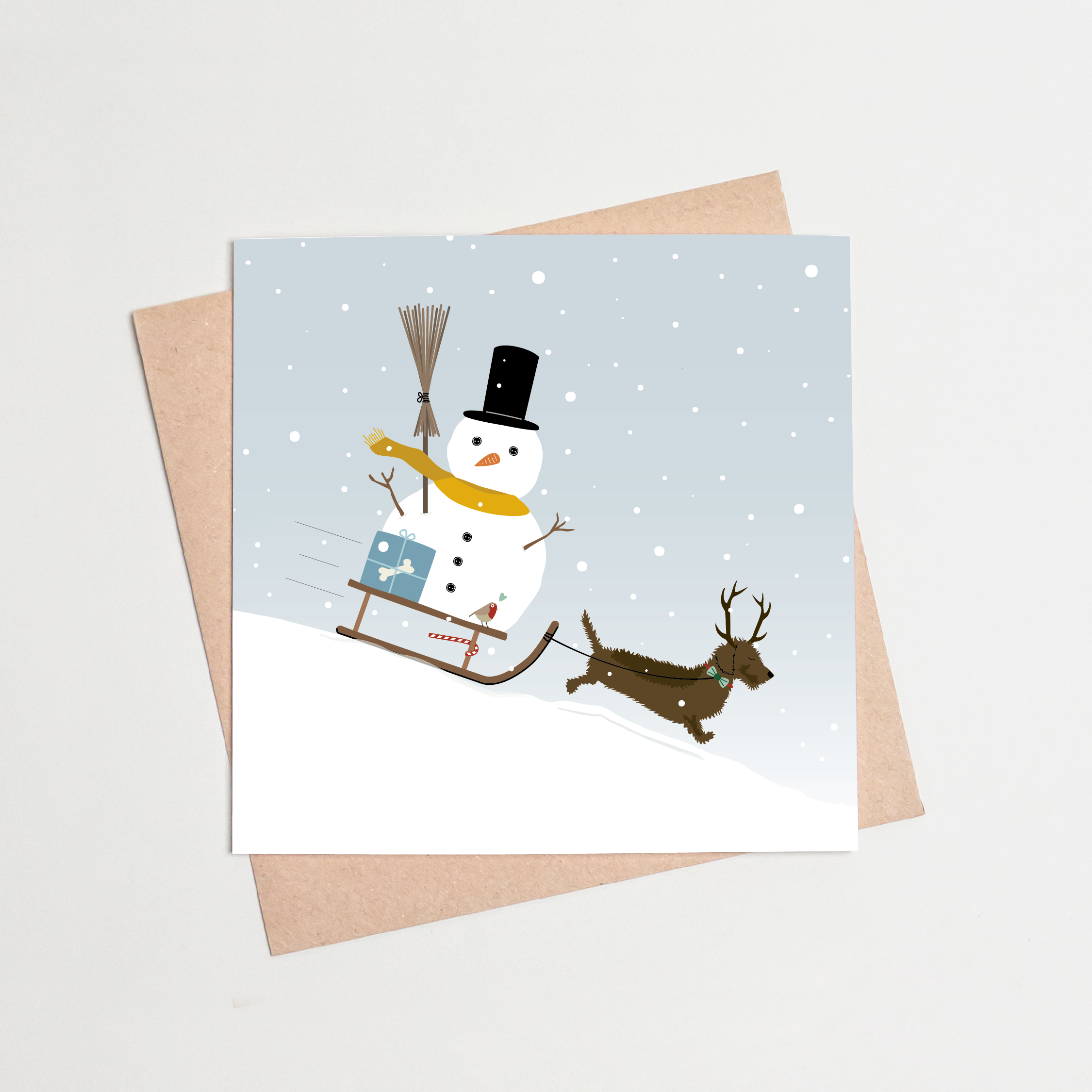 Kerstkaart-teckel-sneeuwpop