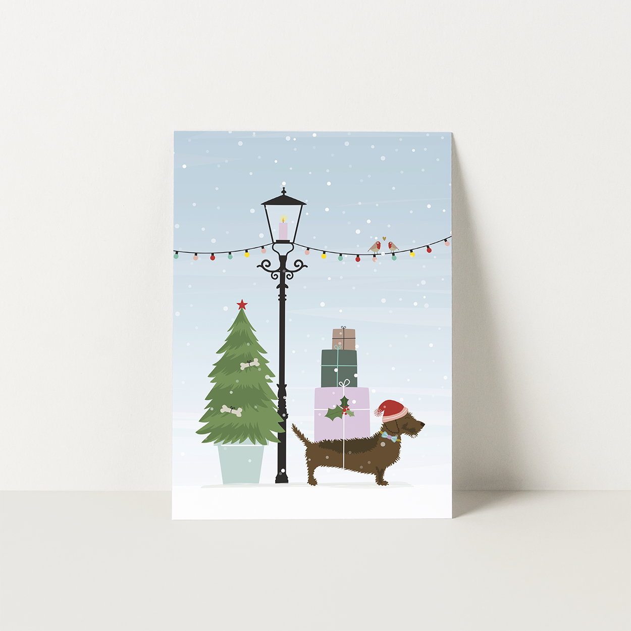 kerstkaart-teckel-cadeautjes-buiten-lampjes