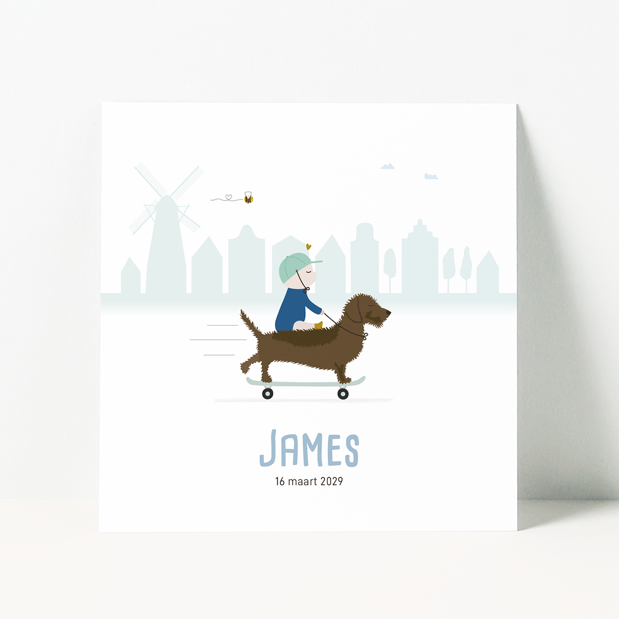 geboortekaartje jongen met teckel op skateboard en baby op de rug.