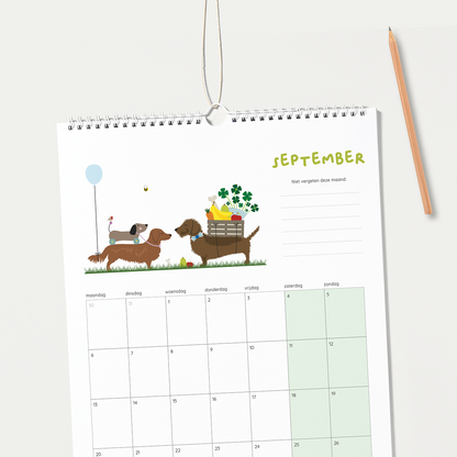 maandplanner teckel - Frits trekt een bakfiets vol fruit met vriendje