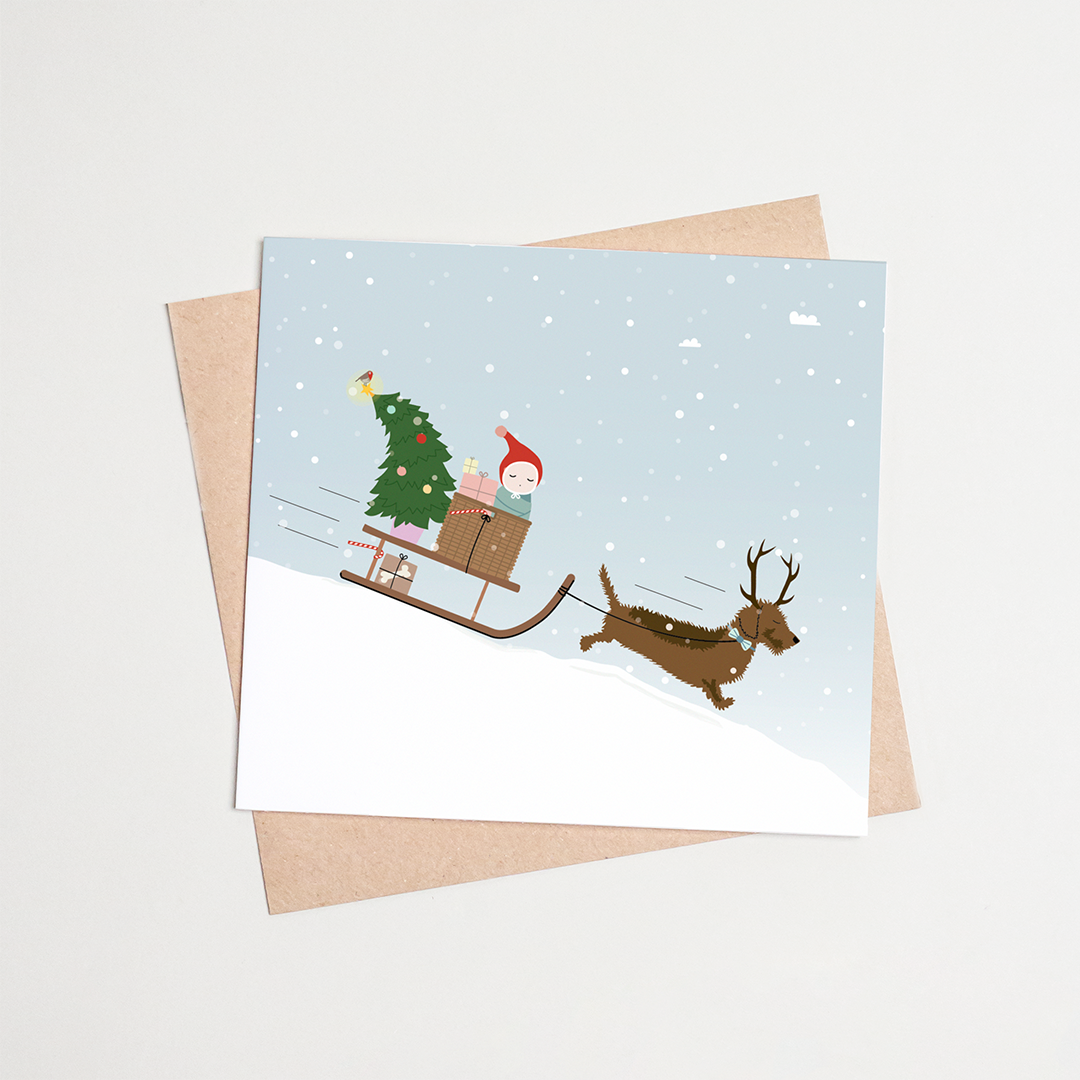 teckel-kerstkaarten-slee-sneeuw