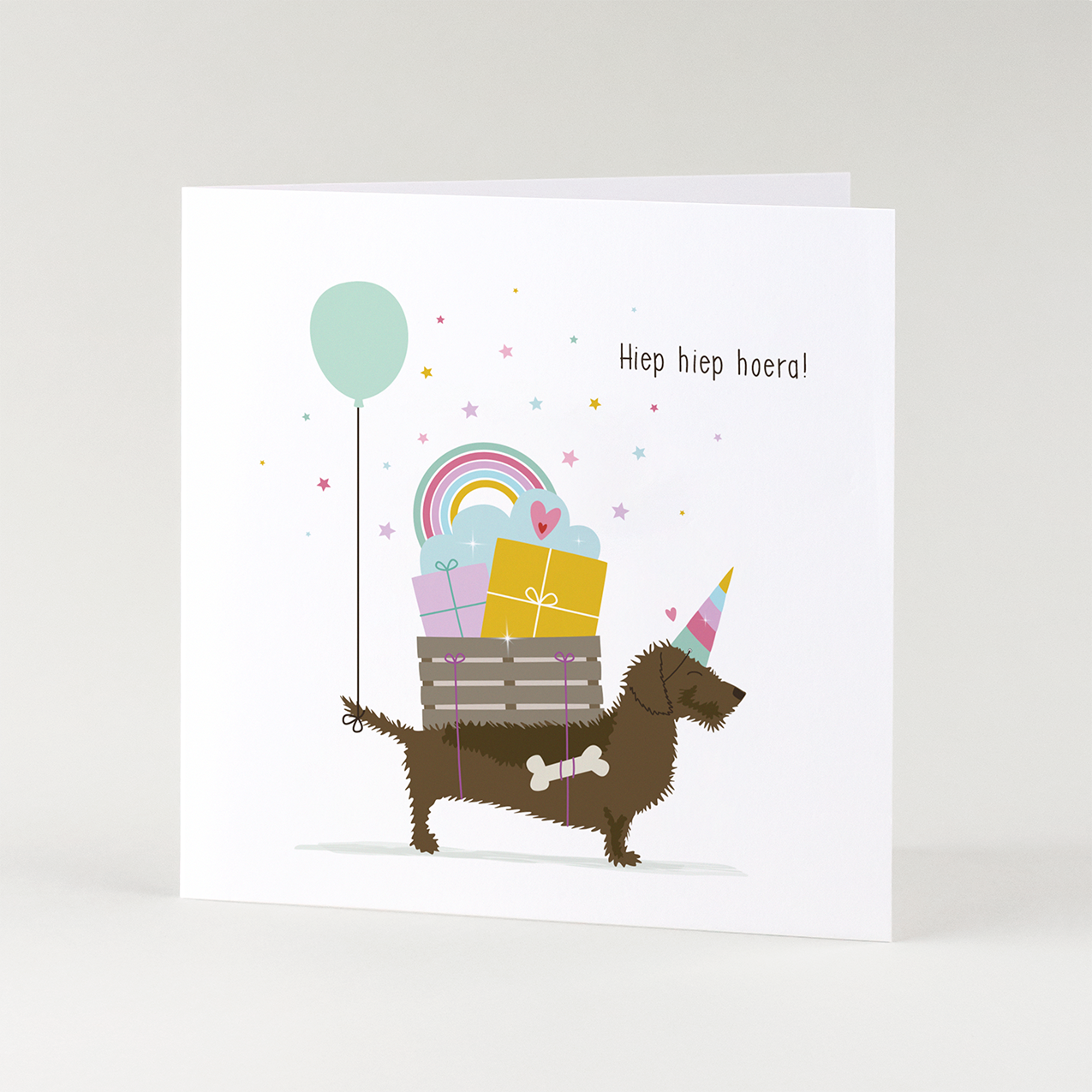 Verjaardagskaart voor meisje met teckel en unicorn - vrolijke geïllustreerde teckel wenskaart.